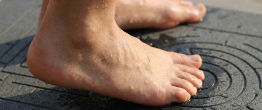 Stability Engineering: Why Rigid Stone Prevents Slips Better Than Rubber-Backed Cloth