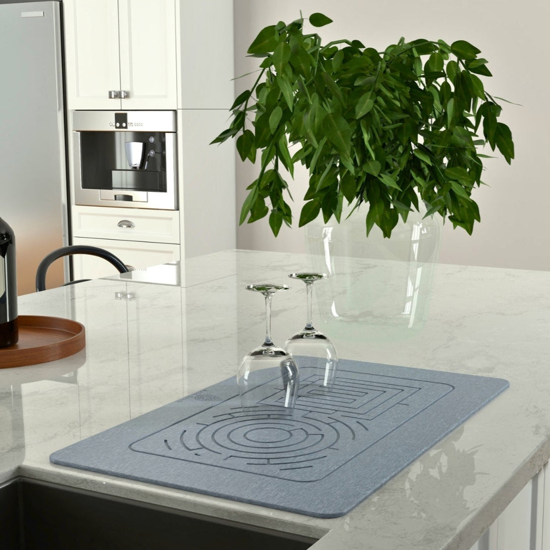 The Maze Oasis stone mat used as a modern, functional kitchen accessory.


