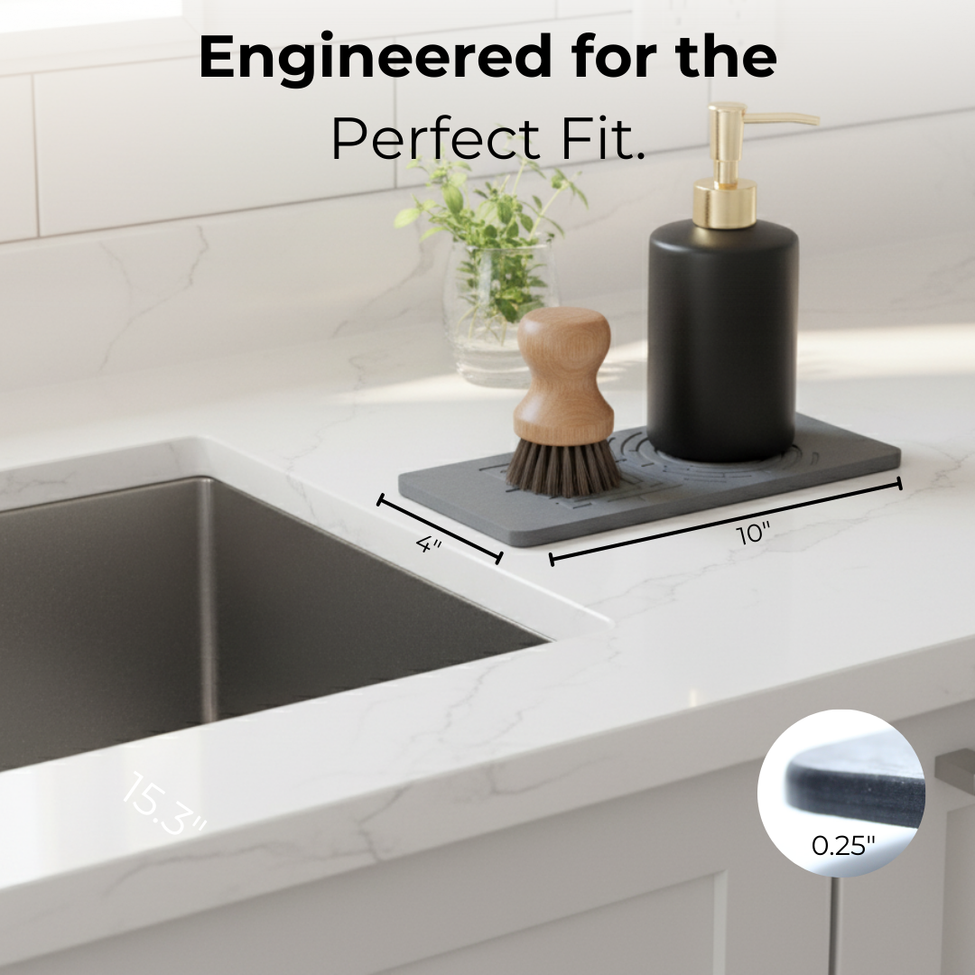 Kitchen sink with soap dispenser and measuring dimensions on a countertop. A modern stone sink caddy in a clean, minimalist kitchen.

