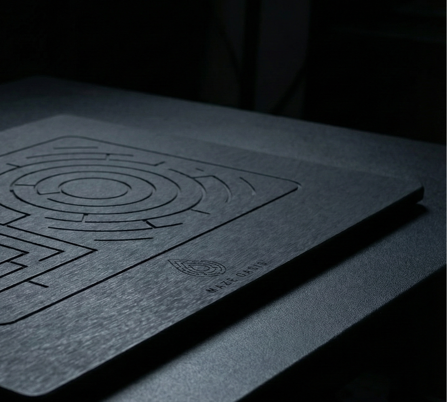 Dark textured surface with a geometric pattern